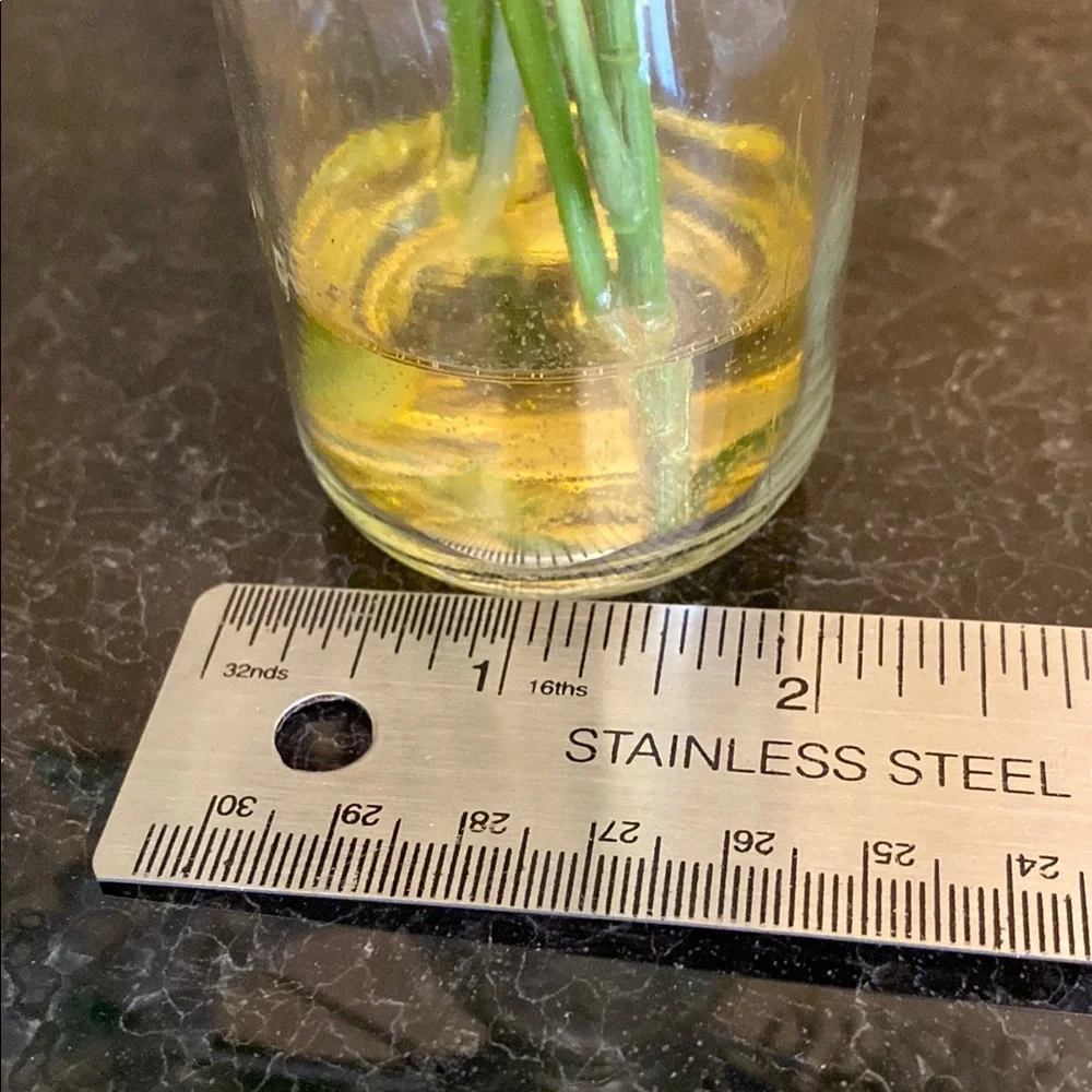 Floral Arrangement in Glass Vase 12” tall.